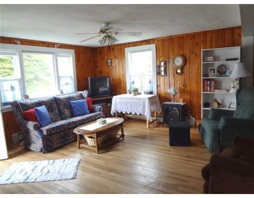 29 Mills Road Kennebunkport, ME 04046 - Photo 4 of 21 Living Room. Knotty pine paneling...
