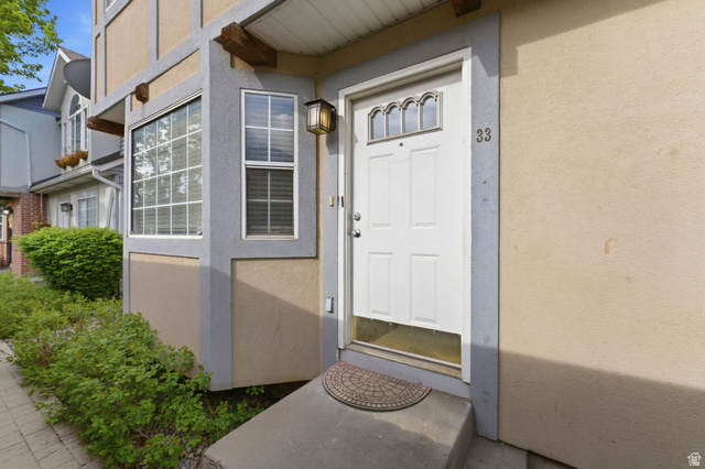 1052 South 950 East, Unit 33 Provo, UT 84606 - Photo 10 of 12 View of exterior entry with stucco siding