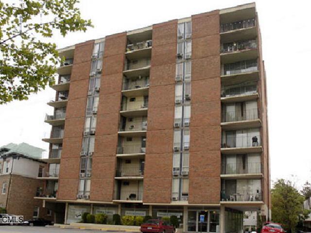 87 Glenbrook Road, Unit 4G Stamford, CT 06902 - Photo 1 of 1 a front view of a building