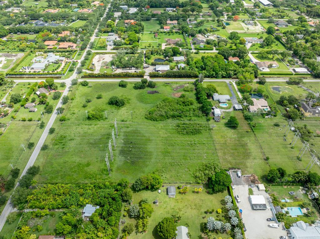 66 Southwest St Ranches Southwest Ranches, FL 33331 - Photo 5 of 14 a view of a lake with a large building
