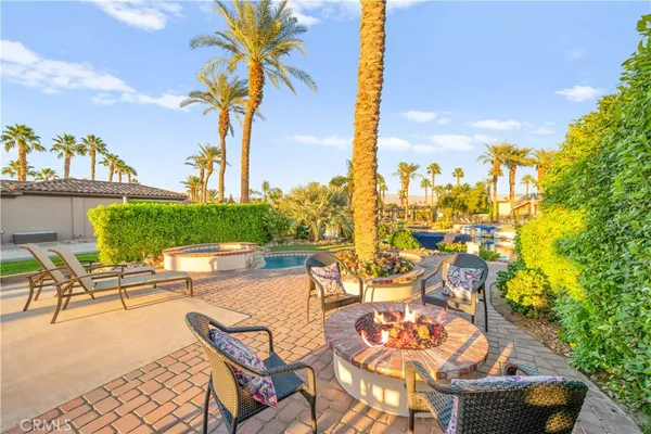 a view of a terrace with furniture