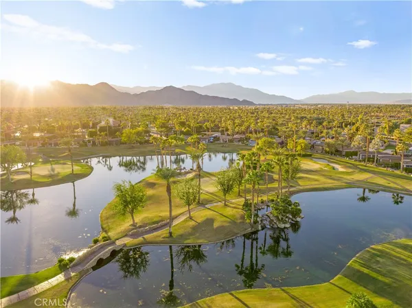 a view of a swimming pool with an ocean view