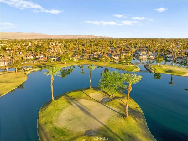 a view of an ocean and a mountain