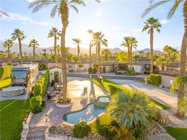a view of a swimming pool with a terrace