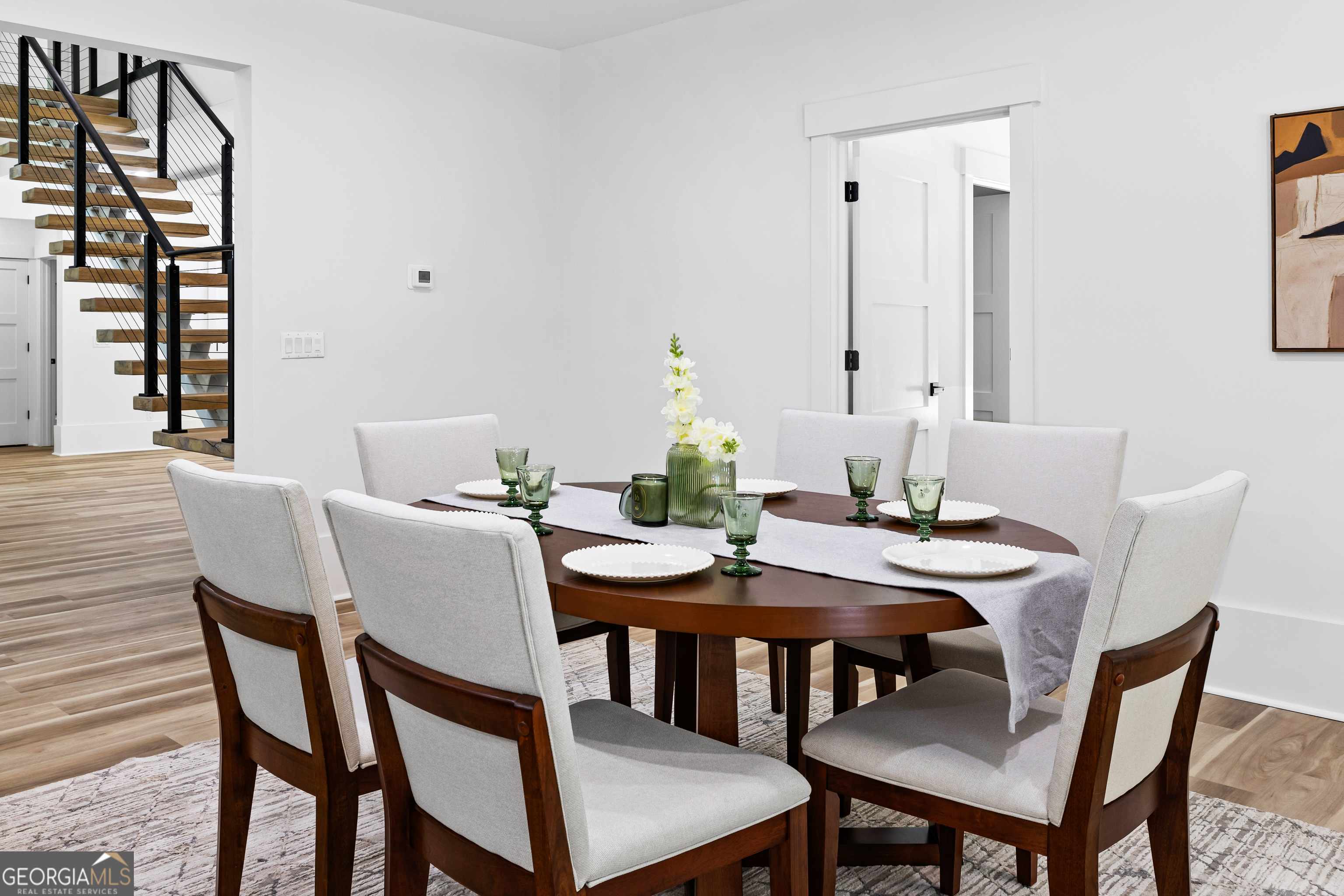 354 Turner Road Newnan, GA 30263 - Photo 36 of 79 a view of a dining room with furniture and window