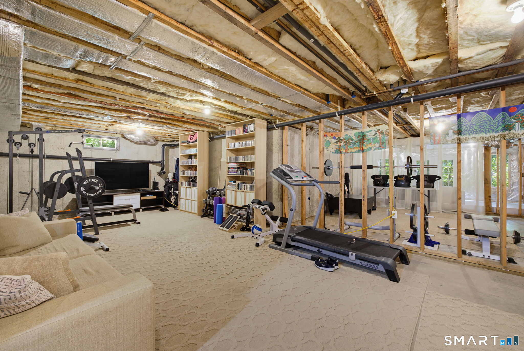 158 Appian Way Coventry, CT 06238 - Photo 38 of 40 a view of a room with gym equipment