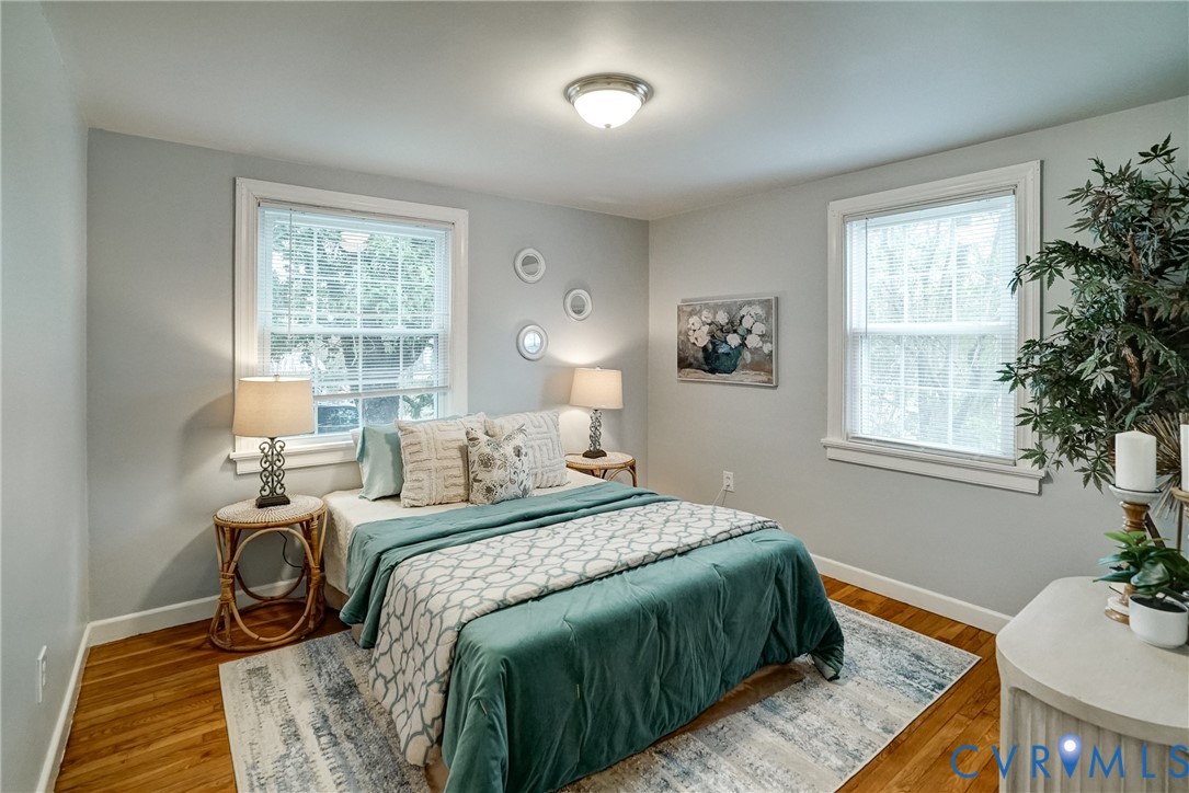 7502 Sweetbriar Road Henrico, VA 23229 - Photo 16 of 28 a bedroom with a bed and window