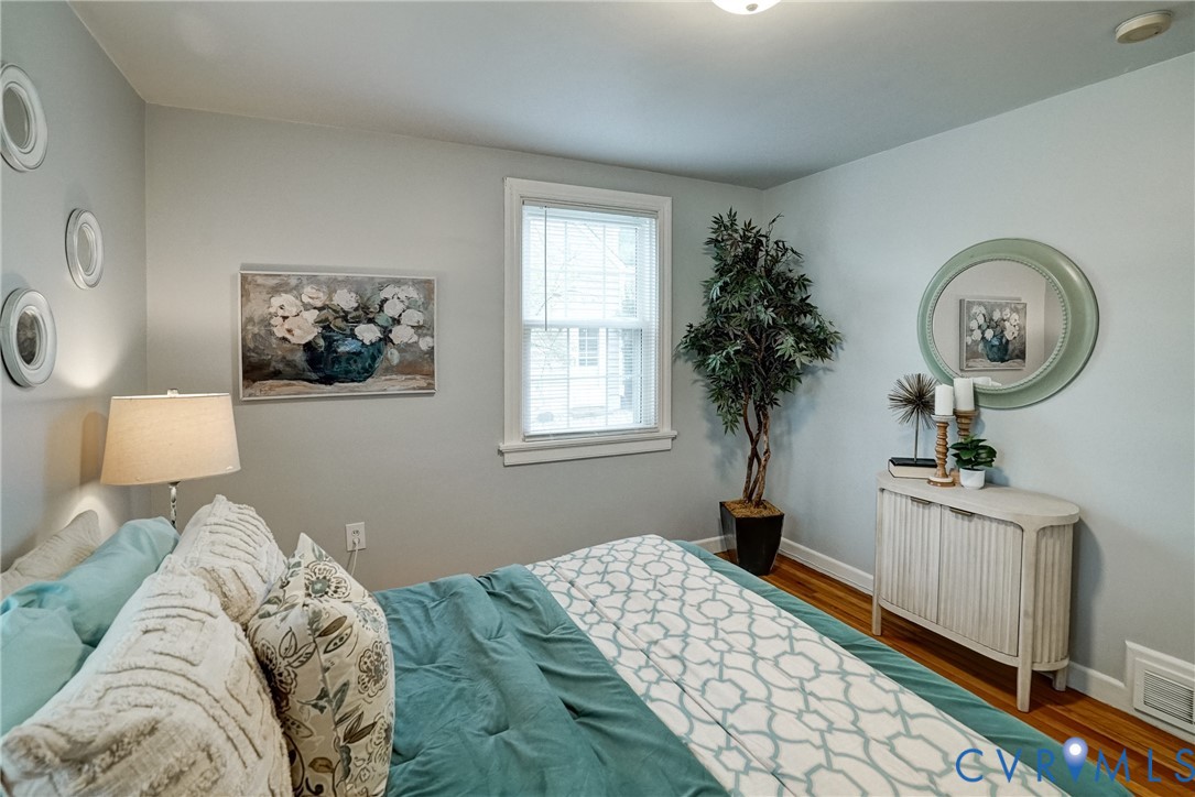 7502 Sweetbriar Road Henrico, VA 23229 - Photo 17 of 28 a bedroom with bed and a window