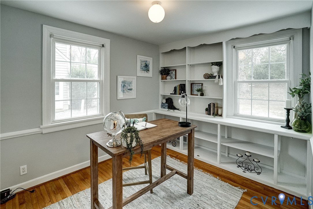 7502 Sweetbriar Road Henrico, VA 23229 - Photo 18 of 28 a view of a workspace with furniture and a window