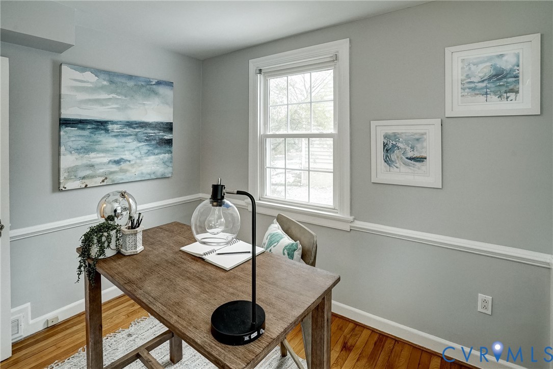 7502 Sweetbriar Road Henrico, VA 23229 - Photo 20 of 28 a view of a dining room with furniture and wooden floor