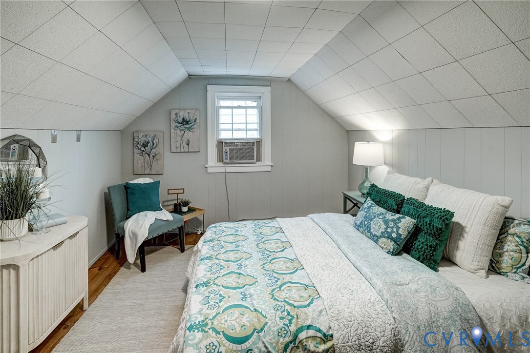 7502 Sweetbriar Road Henrico, VA 23229 - Photo 22 of 28 a bedroom with a bed and a couch