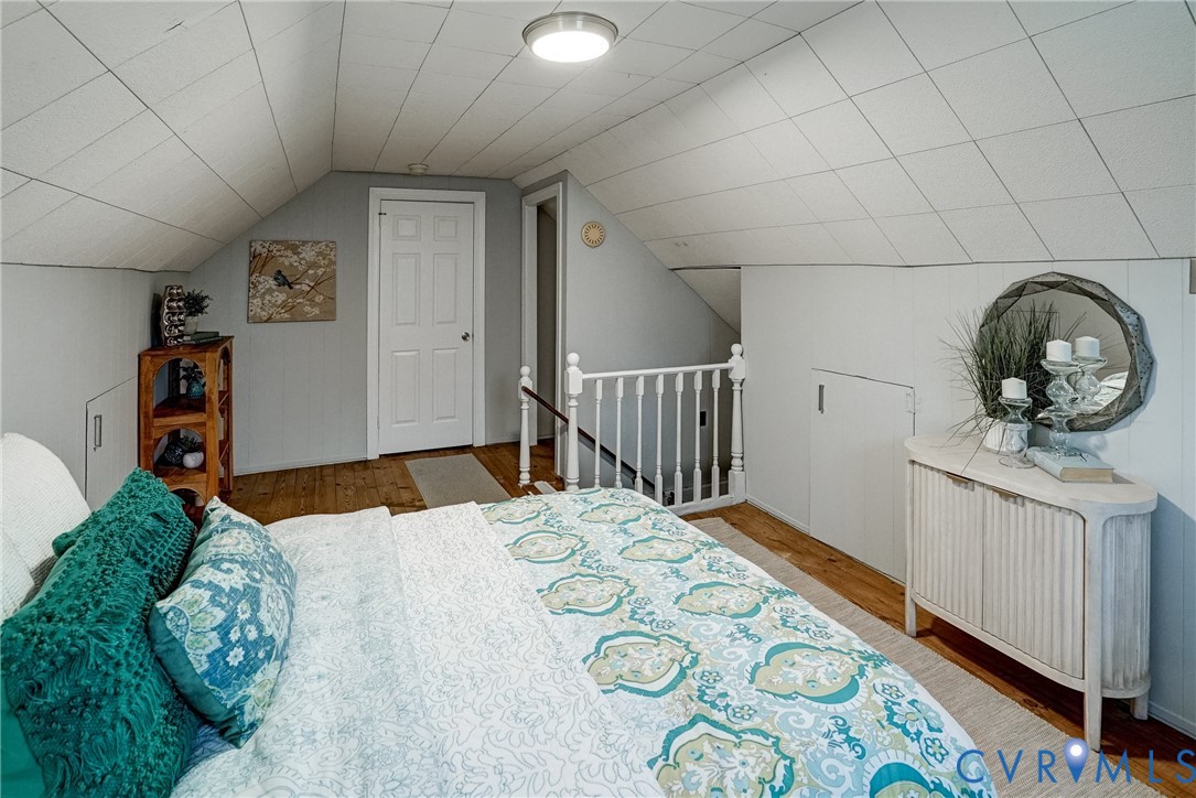 7502 Sweetbriar Road Henrico, VA 23229 - Photo 23 of 28 a bedroom with a bed window and a mirror