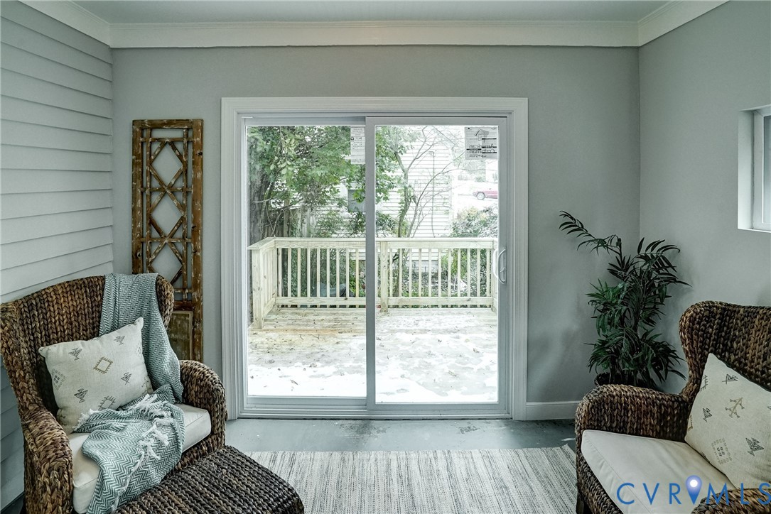 7502 Sweetbriar Road Henrico, VA 23229 - Photo 7 of 28 a living room with furniture and a window