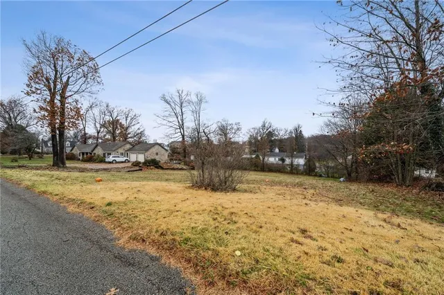 a view of yard covered with snow