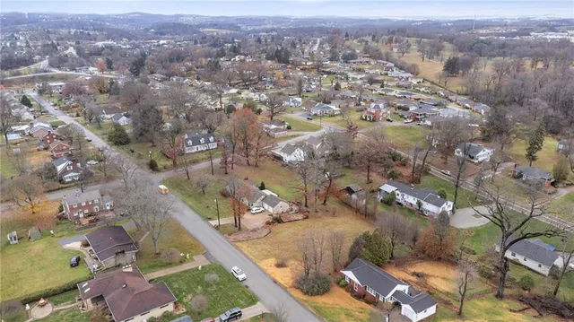 an aerial view of a city with lots of residential buildings
