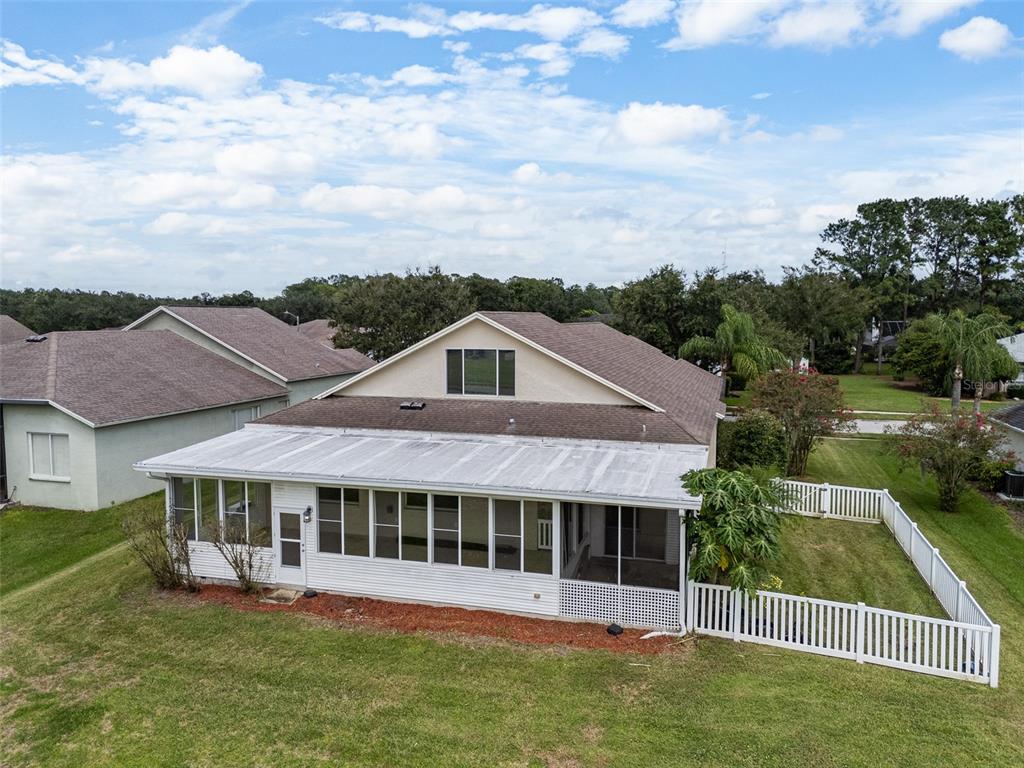 5909 Wedgefield Drive Zephyrhills, FL 33541 - Photo 24 of 54 front view of a house with a yard