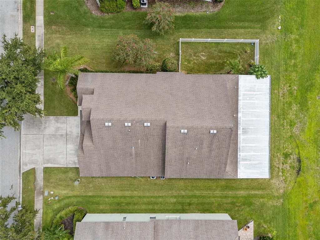 5909 Wedgefield Drive Zephyrhills, FL 33541 - Photo 25 of 54 a view of a back yard