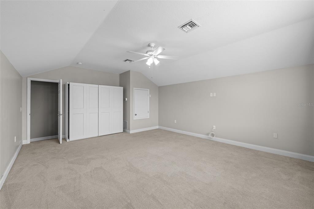 5909 Wedgefield Drive Zephyrhills, FL 33541 - Photo 53 of 54 a view of an empty room