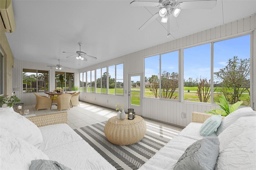 5909 Wedgefield Drive Zephyrhills, FL 33541 - Photo 10 of 54 a living room with furniture and a large window