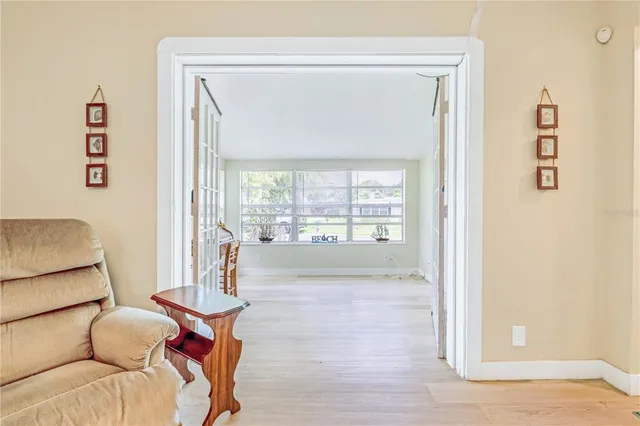 a view of a livingroom with furniture and window