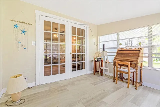 a bathroom with a sink toilet and a window