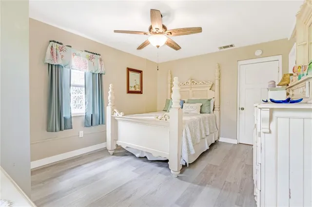 a room with a mirror and furniture