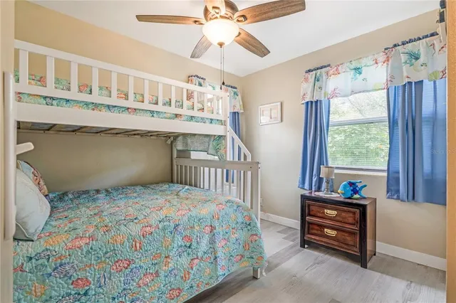 a bathroom with a tub sink and a mirror
