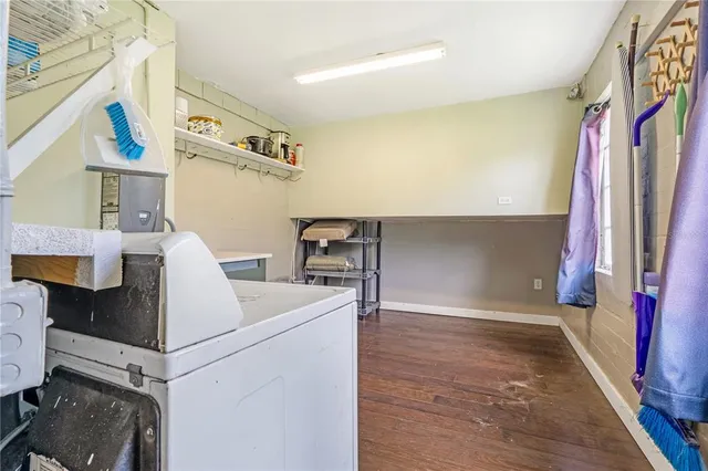 an aerial view of a house with backyard