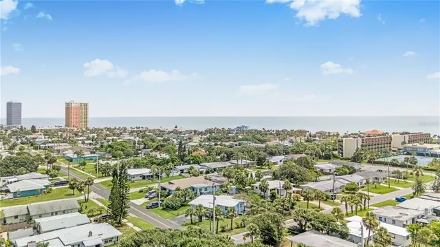 an aerial view of a house with a garden