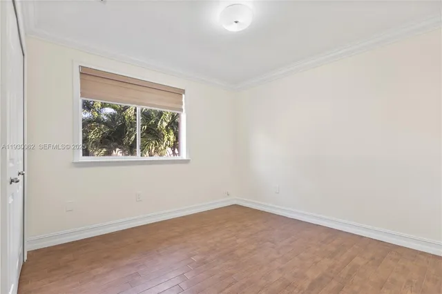 wooden floor and closet in a room
