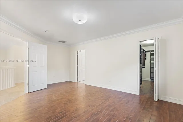 a bathroom with a bathtub sink and mirror