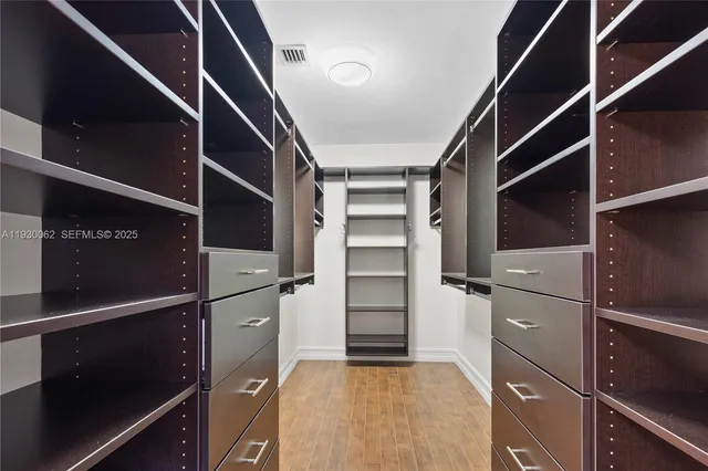 a view of an empty walk in closet