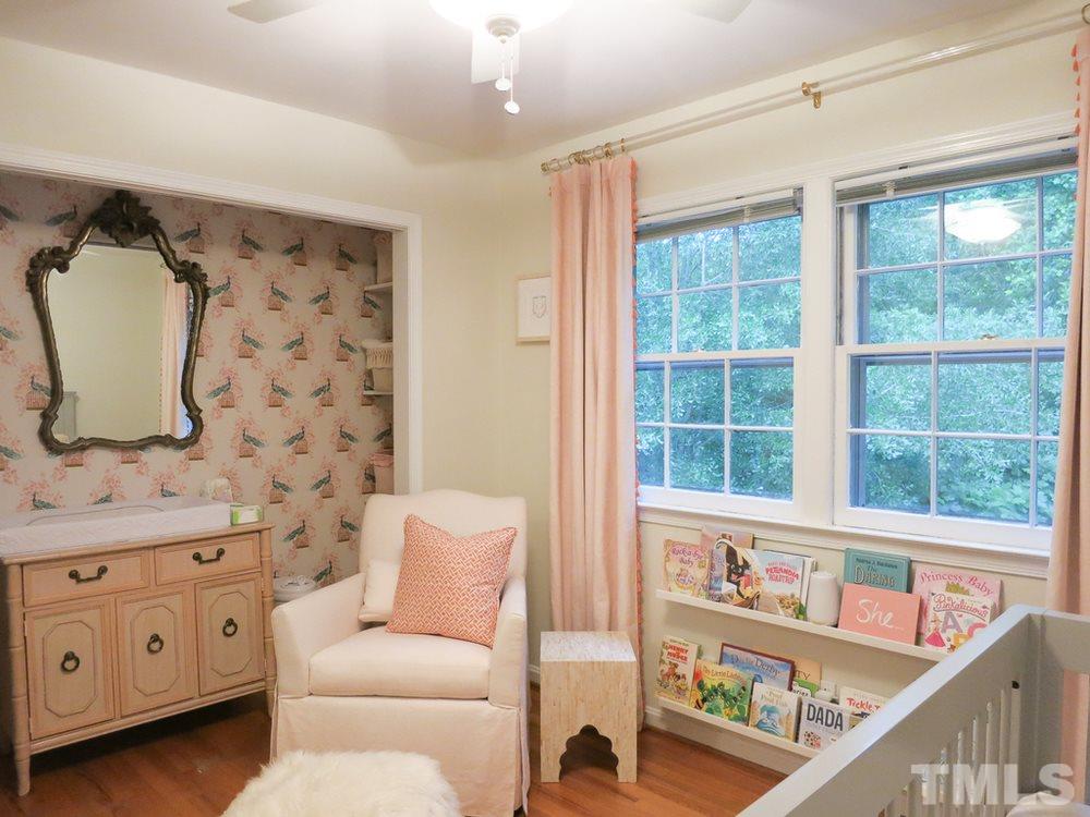 5215 Knollwood Road Raleigh, NC 27609 - Photo 26 of 30 a living room with furniture and a window