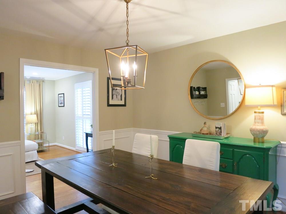 5215 Knollwood Road Raleigh, NC 27609 - Photo 8 of 30 a view of a dining room with furniture