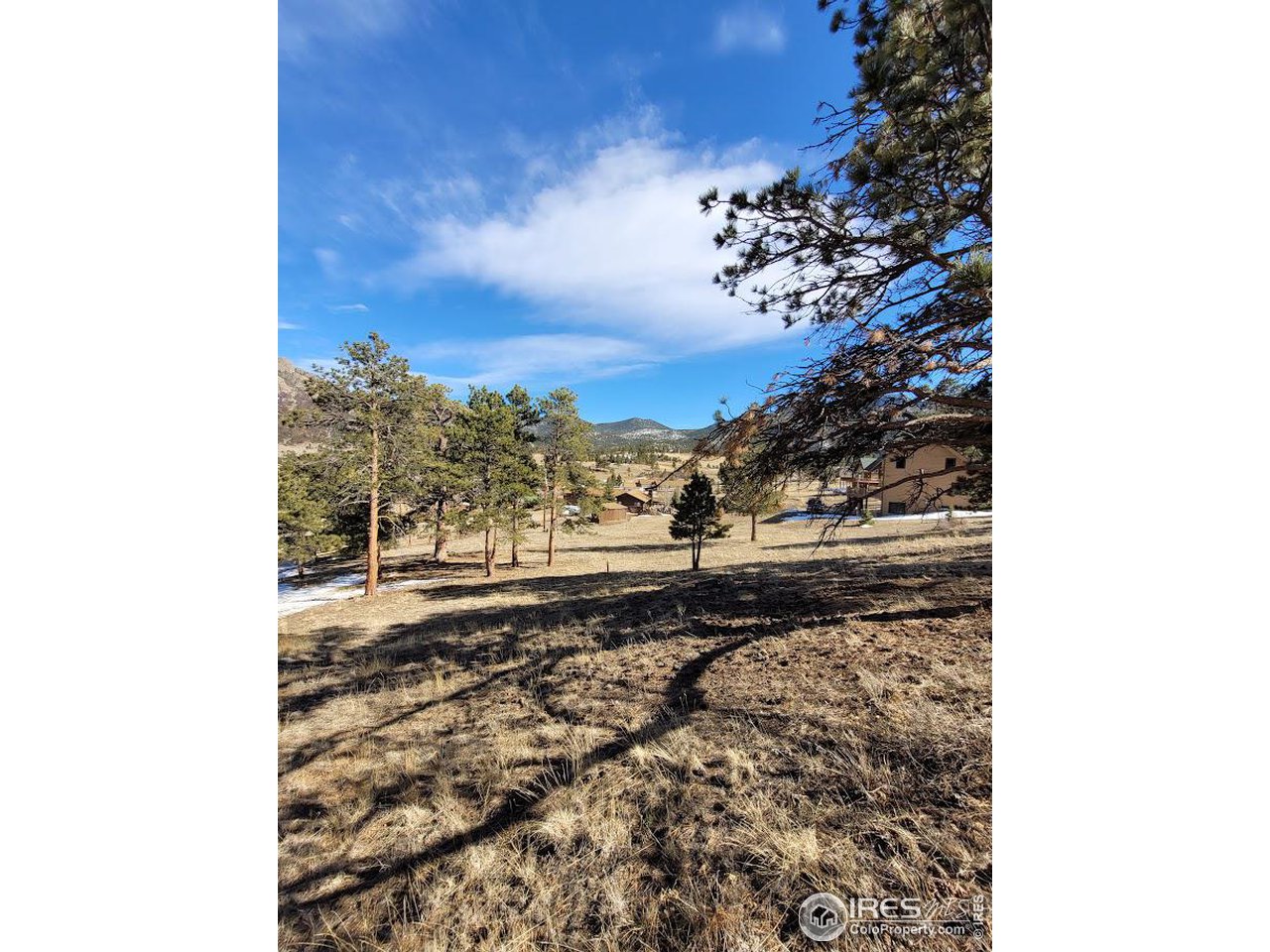 2630 Ridge Lane Estes Park, CO 80517 - Photo 27 of 31 a view of a yard with wooden fence