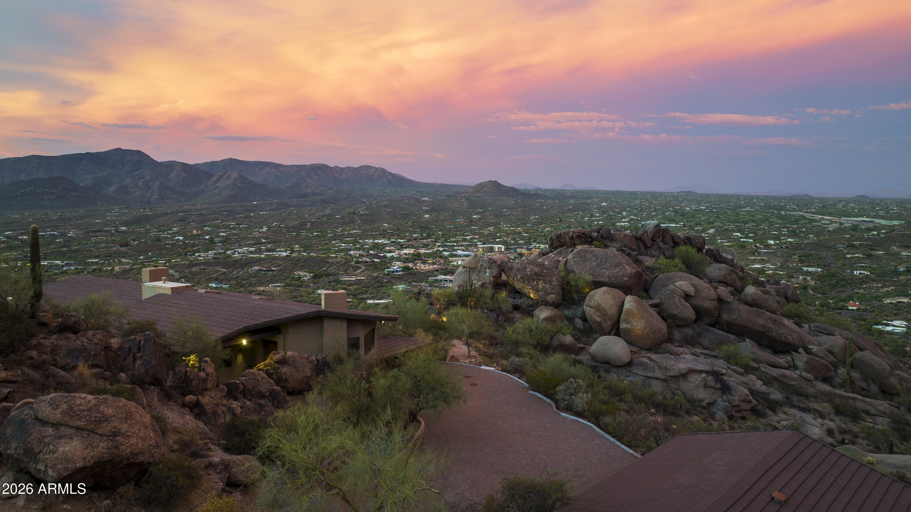 6700 East Hawksnest Road Carefree, AZ 85377 - Photo 1 of 82 a view of a city with mountains in the background