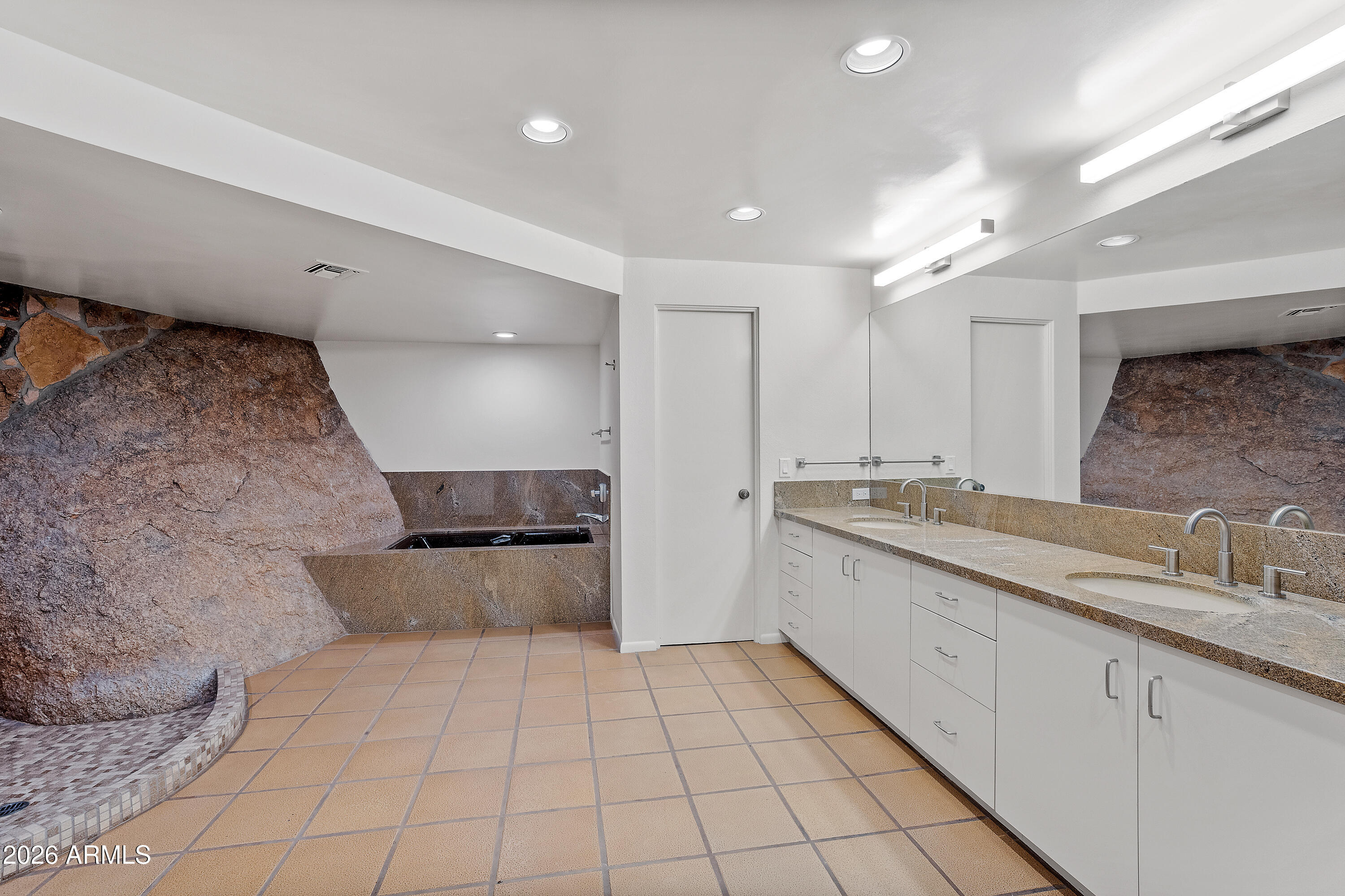 6700 East Hawksnest Road Carefree, AZ 85377 - Photo 38 of 82 a large kitchen with a sink and cabinets