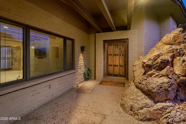 a view of a city with lush green forest