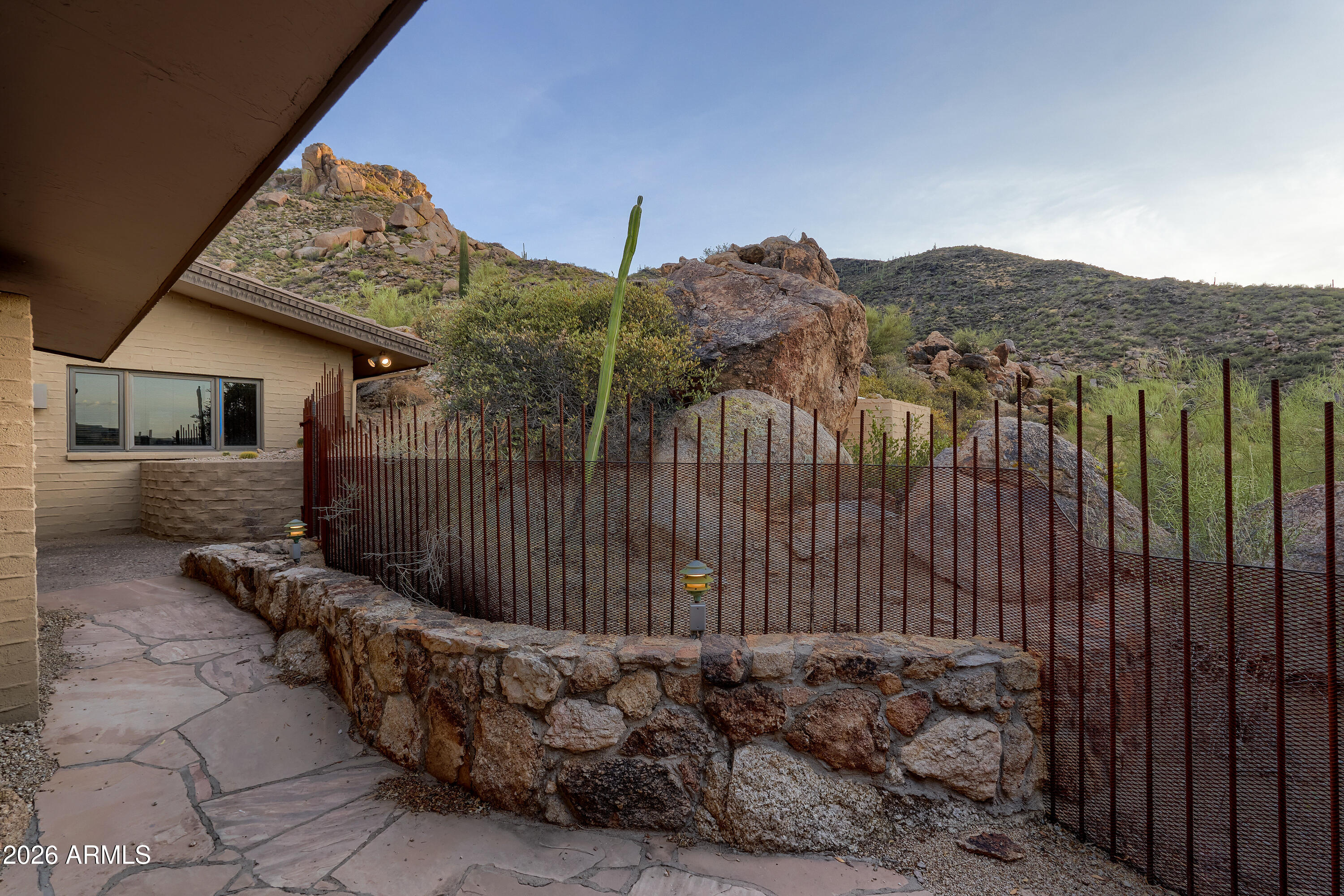 6700 East Hawksnest Road Carefree, AZ 85377 - Photo 58 of 82 a view of a house with a street