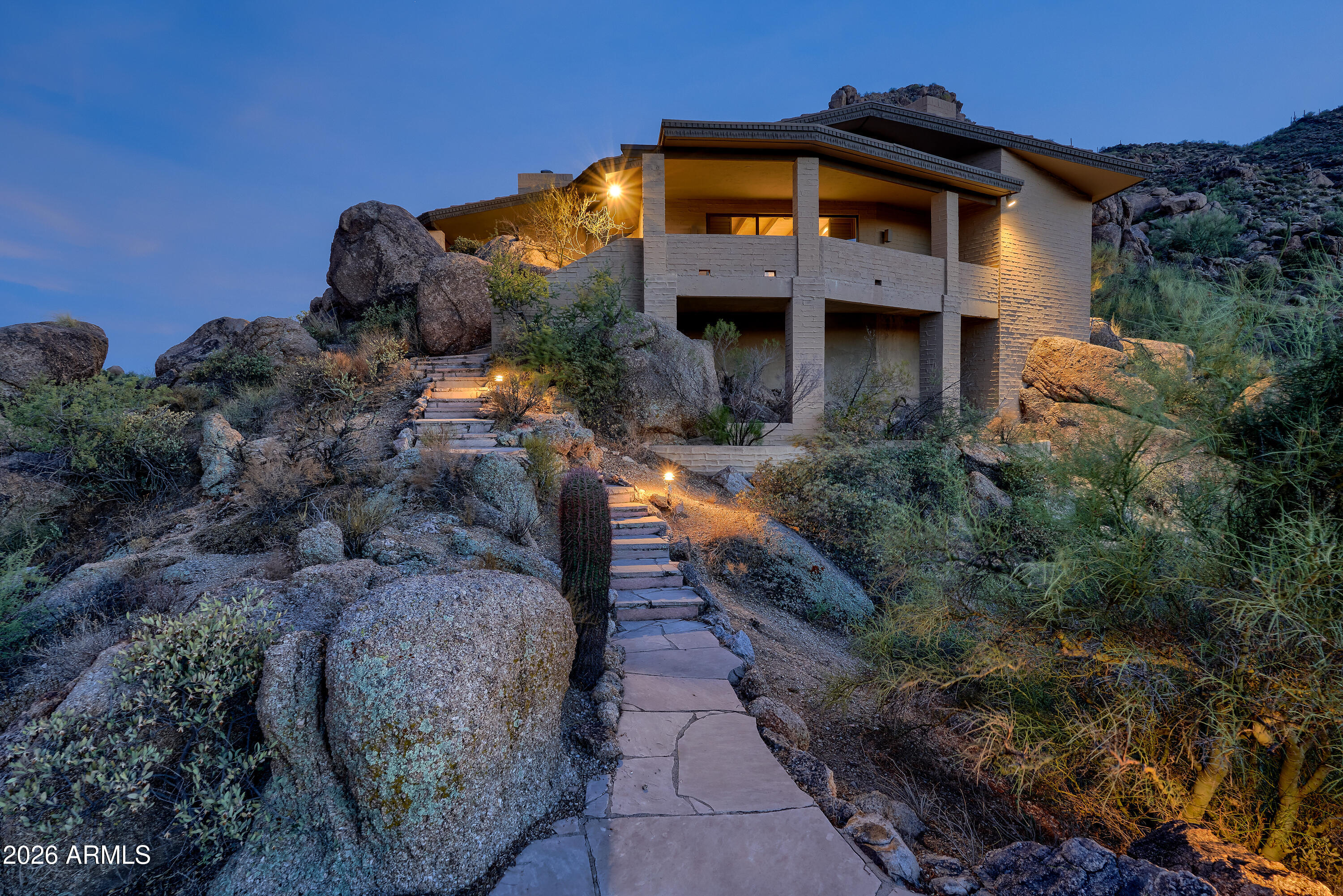 6700 East Hawksnest Road Carefree, AZ 85377 - Photo 72 of 82 a front view of a house with a yard