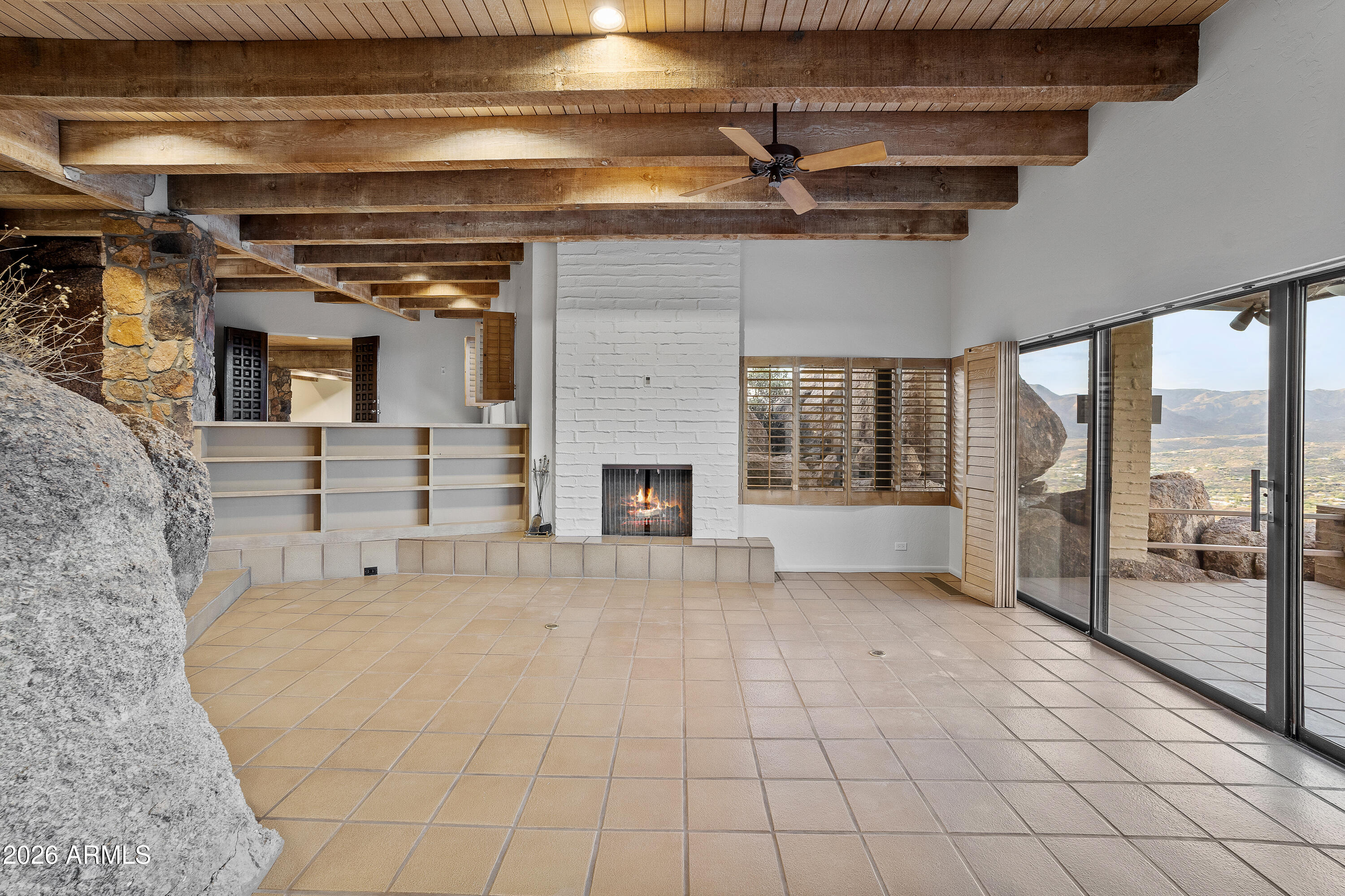 6700 East Hawksnest Road Carefree, AZ 85377 - Photo 10 of 82 a view of a livingroom with a fireplace
