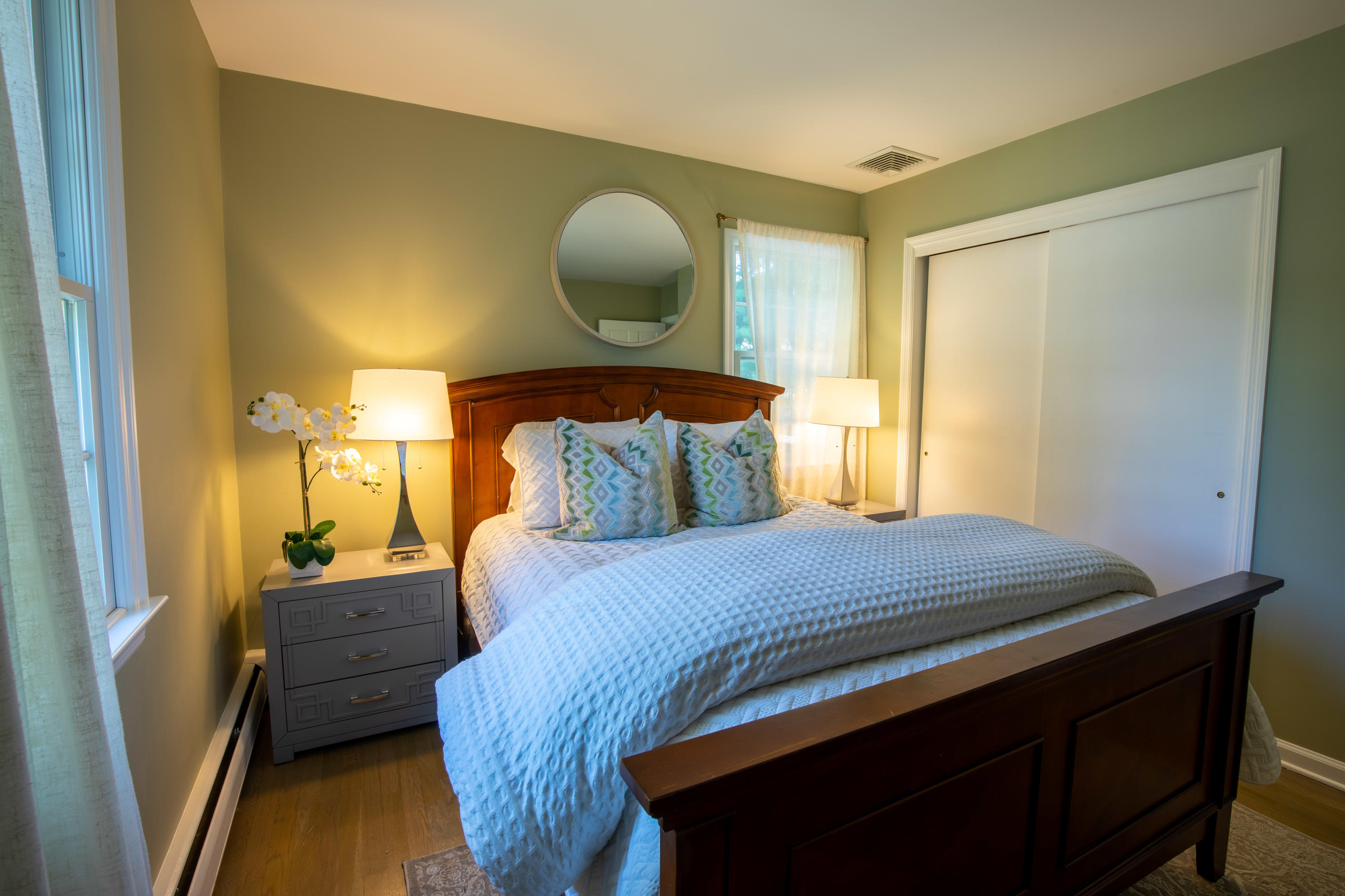 10 Old Field Road Norwalk, CT 06853 - Photo 12 of 21 a bedroom with a bed and wooden floor