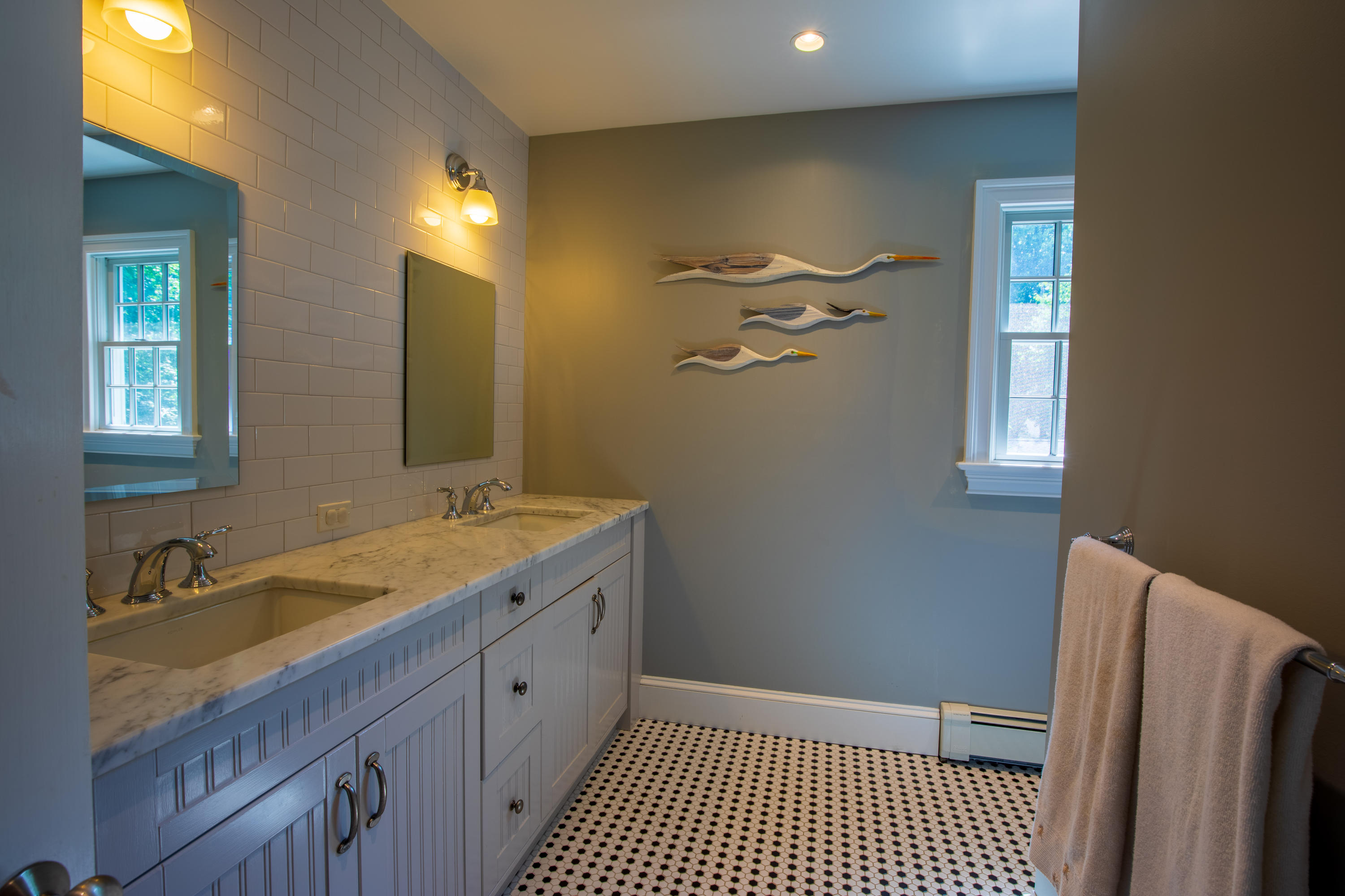 10 Old Field Road Norwalk, CT 06853 - Photo 13 of 21 a bathroom with a sink a mirror and a shower