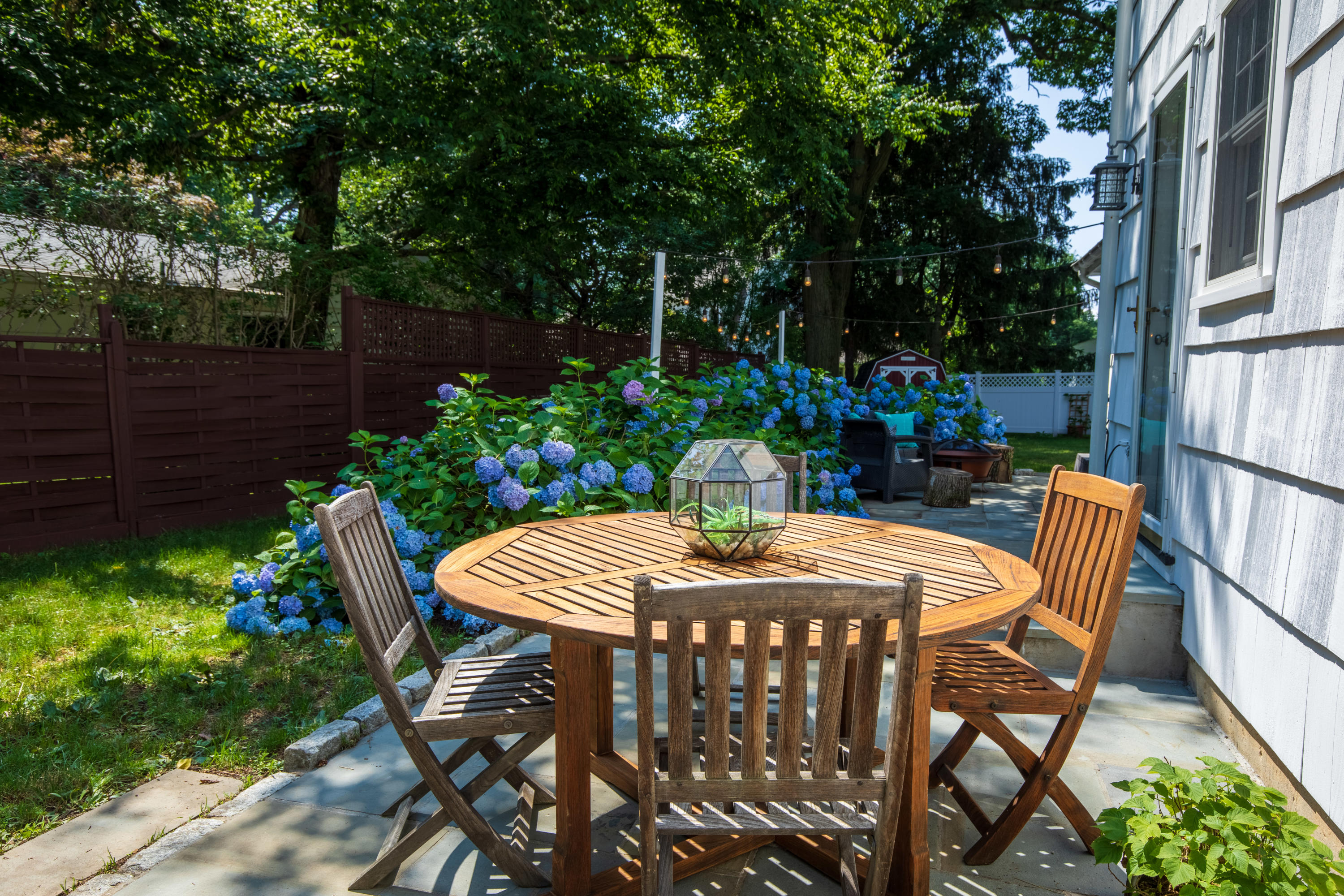 10 Old Field Road Norwalk, CT 06853 - Photo 17 of 21 a view of a patio with a table and chairs