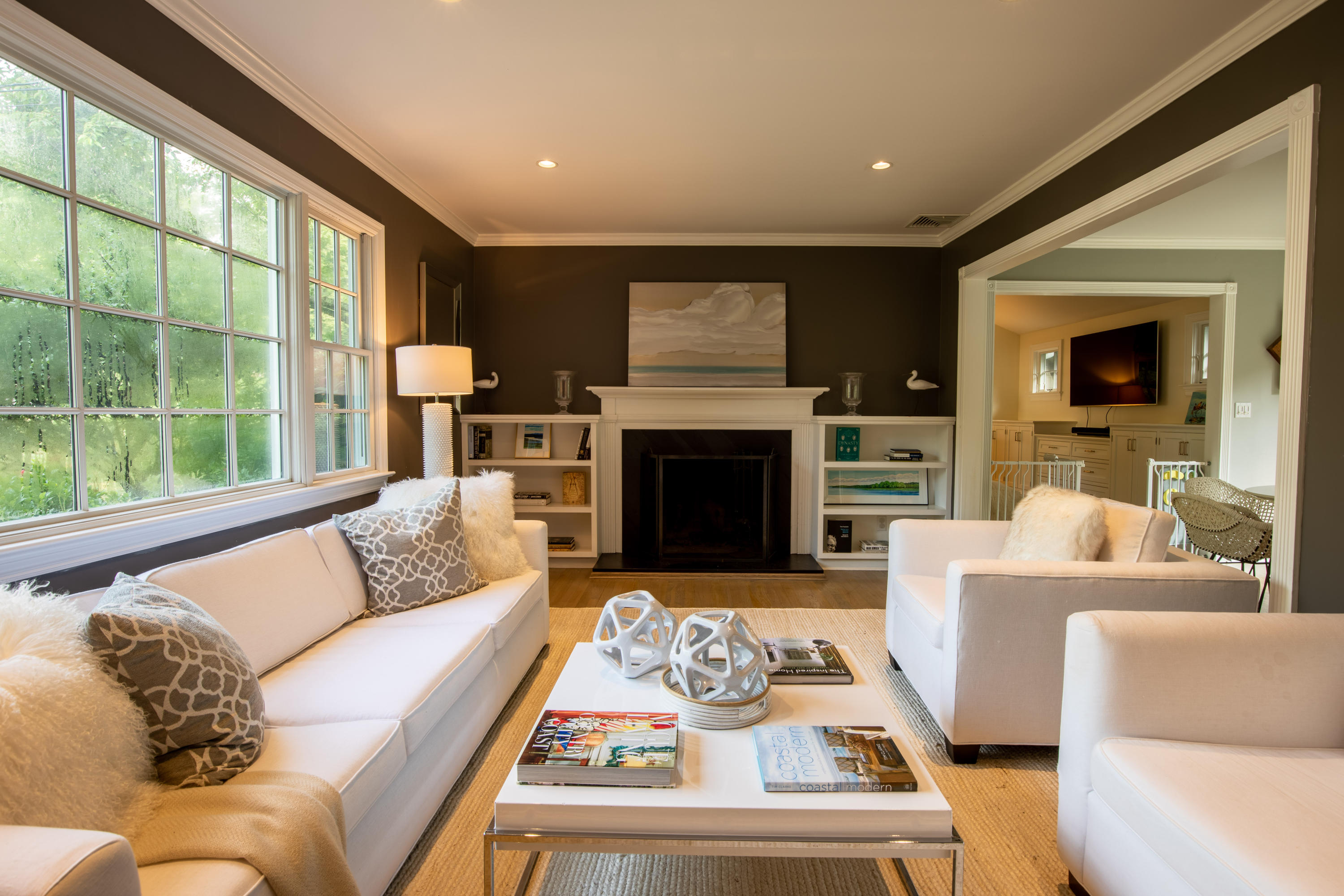 10 Old Field Road Norwalk, CT 06853 - Photo 2 of 21 a living room with furniture large window and a fireplace
