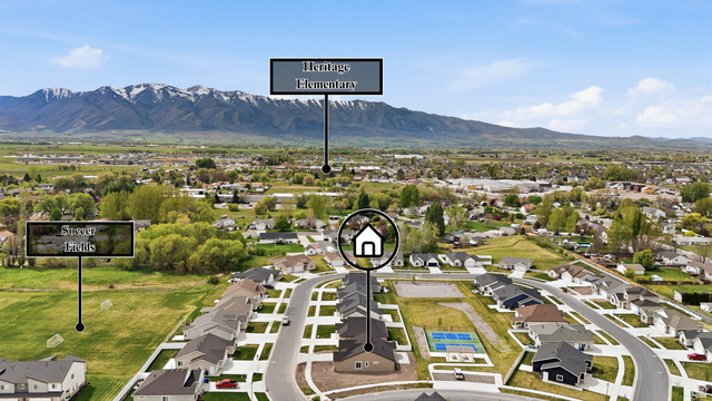 401 West 3085 South, Unit 329 Nibley, UT 84321 - Photo 8 of 34 Aerial view of residential area featuring mountains