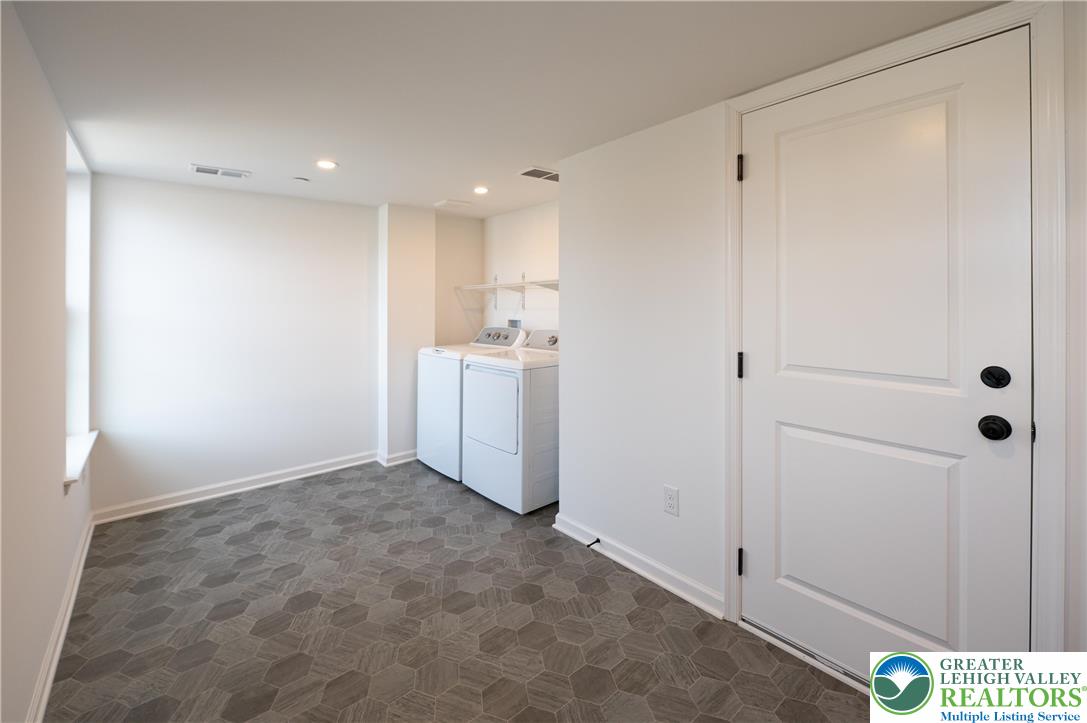 560 Long Street, Unit 1 Emmaus, PA 18049 - Photo 2 of 11 a view of an empty room and closet area