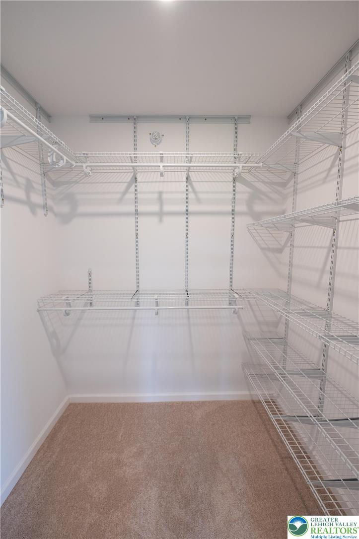 560 Long Street, Unit 1 Emmaus, PA 18049 - Photo 8 of 11 a bathroom with a bathtub