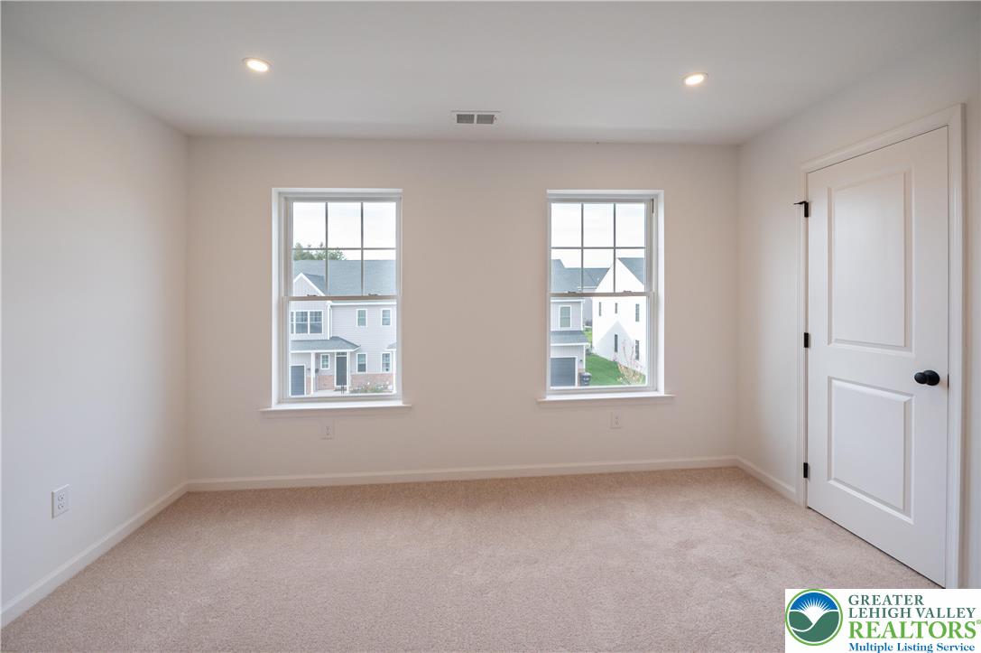 560 Long Street, Unit 1 Emmaus, PA 18049 - Photo 10 of 11 a view of an empty room with a window