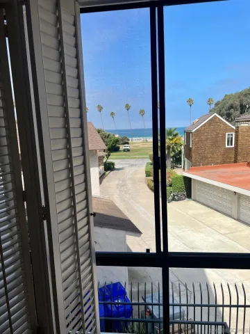 a view of a balcony from a door